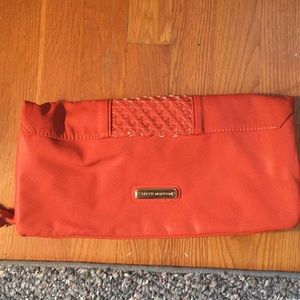Steve Madden fold-over clutch in vegan leather.